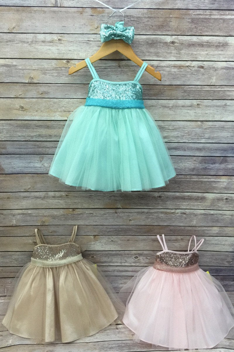 sequin tulle dress in three colors; teal, blush, and champagne