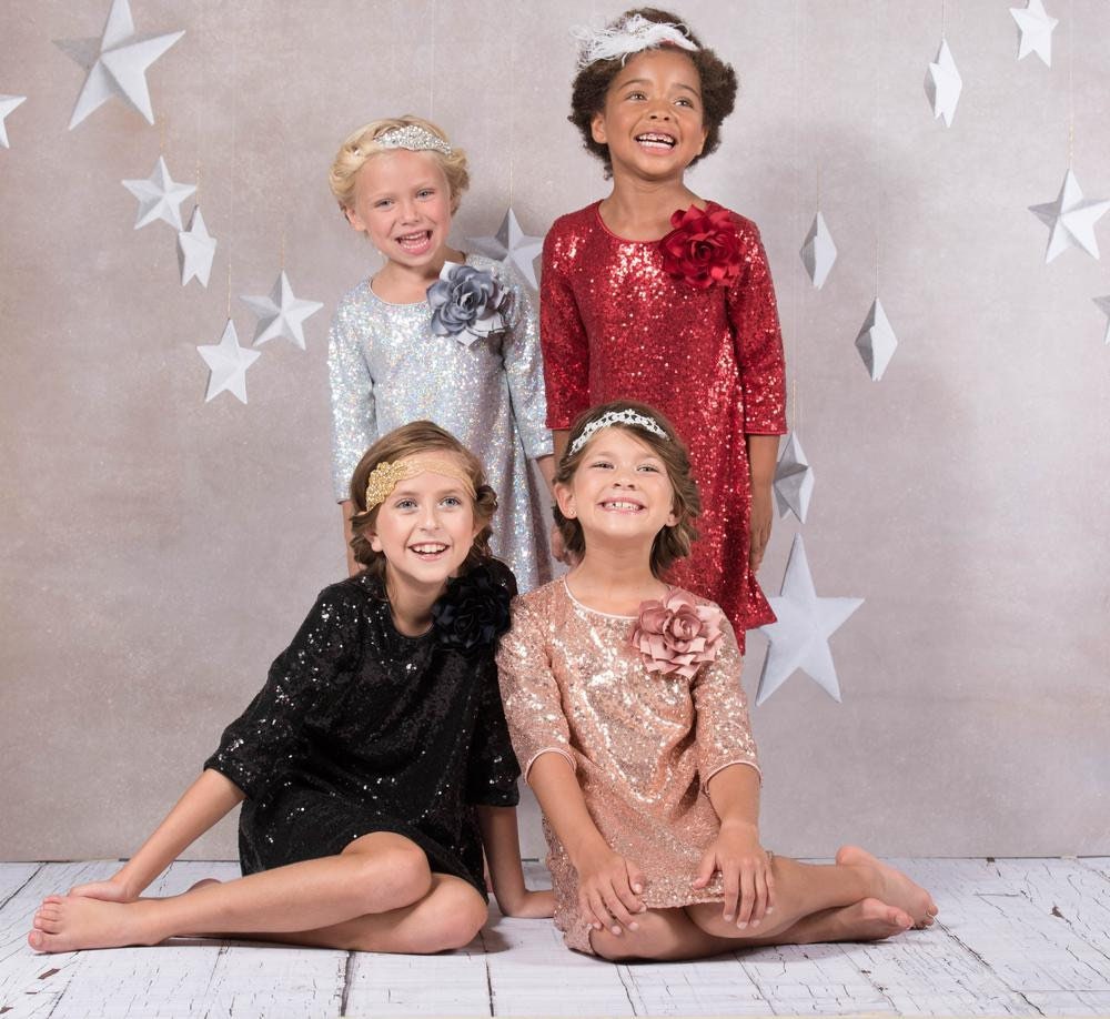 Emma's Magical Dream, sequin sleeve dress with hidden back zipper, removable flower on left shoulder, knee length with 3/4 sleeves, silver, red, black, and blush