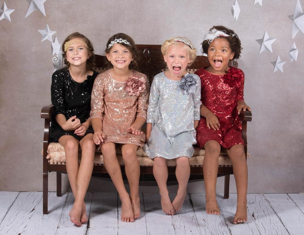 Emma's Magical Dream, sequin sleeve dress with hidden back zipper, removable flower on left shoulder, knee length with 3/4 sleeves, black, blush, silver, and red