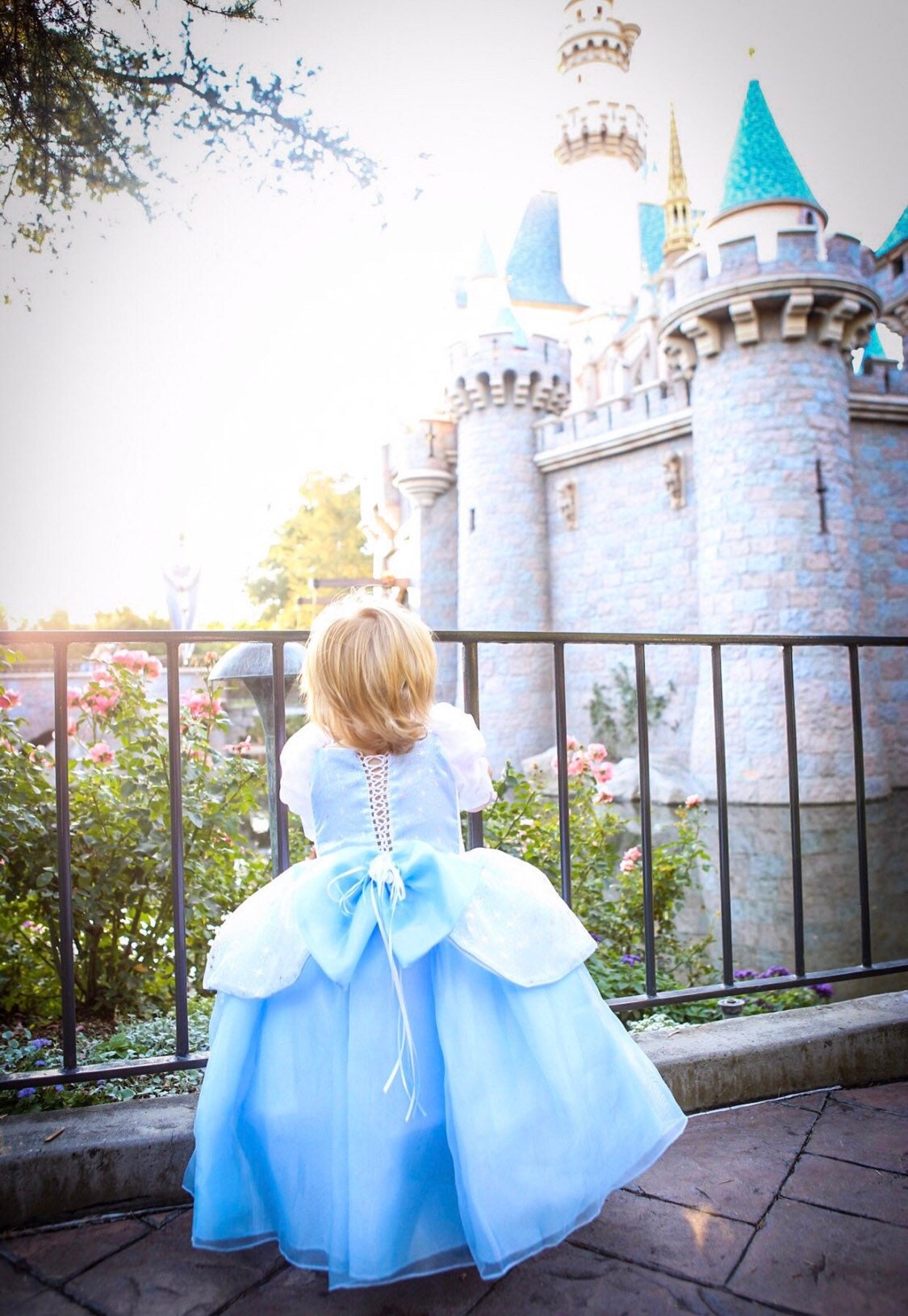 Emma's Magical Dream, Ella dress at princess castle with back lace corset for room to grow. White pedal overlay and blue dress