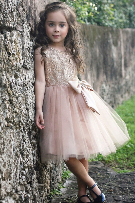 Emma's Magical Dream, rose gold sequin dress with added mesh and silk bow