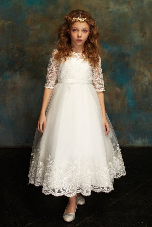 Emma's Magical Dream, tulle dress with lace overlay and lace elbow length sleeves. solid white belt at waist line