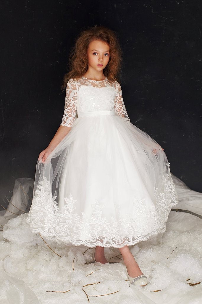 Emma's Magical Dream white lace overlay with high-low hemline and elbow length sleeves