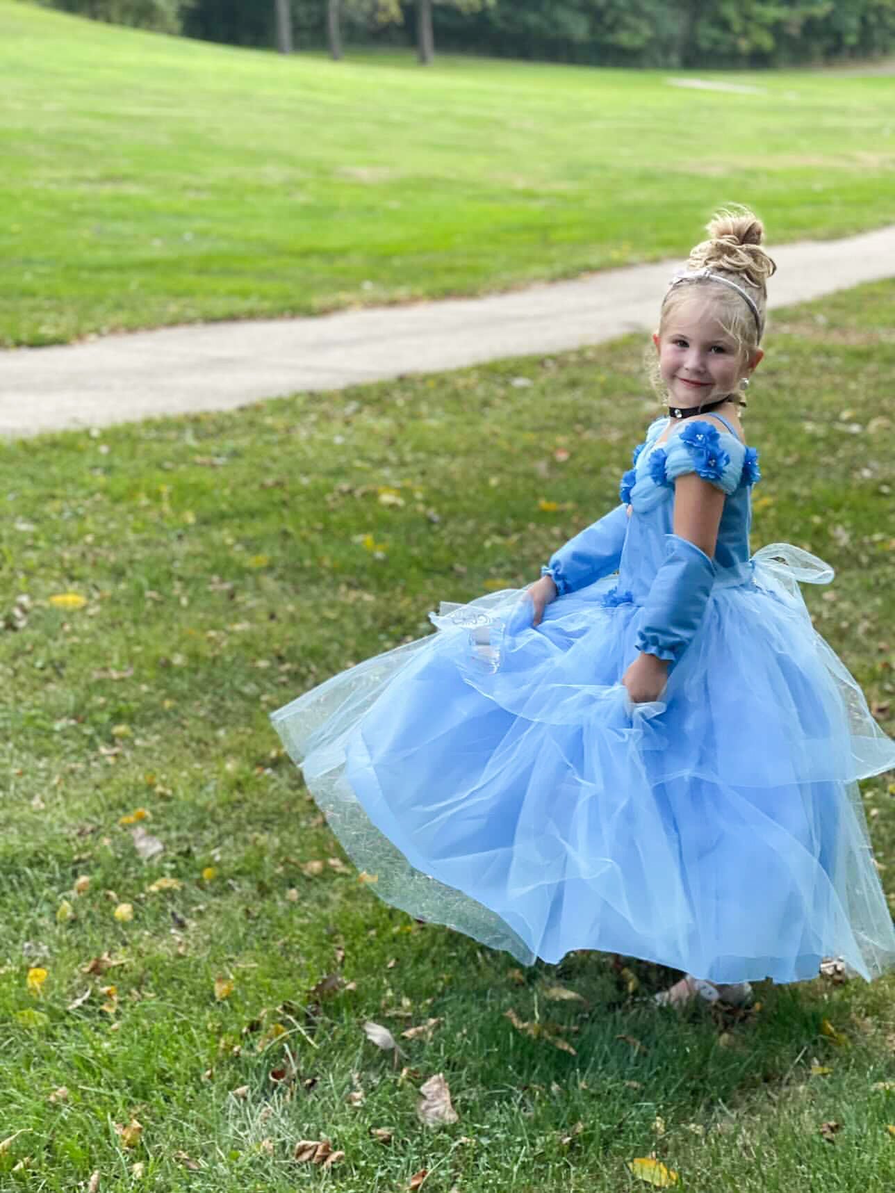 Emma's Magical Dream, blue satin dress with tulle skirt & off the shoulder straps, black choker necklace, and tulle tie